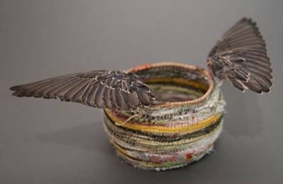 Australian Indigenous (Aboriginal and Torres Strait Islander) artwork by LISA WAUP of Baluk Artists. The title is A Waters Edge. [16-18] (Found Materials and Fibres)