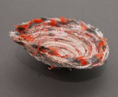 Australian Indigenous (Aboriginal and Torres Strait Islander) artwork by LISA WAUP of Baluk Artists. The title is Connecting Cultures. [231-15] (Found Materials and Fibres)