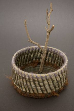 Australian Indigenous (Aboriginal and Torres Strait Islander) artwork by GILLIAN GARVIE of Baluk Artists. The title is Flood. [124-18] (Found Materials and Fibres)
