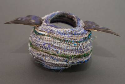 Australian Indigenous (Aboriginal and Torres Strait Islander) artwork by LISA WAUP of Baluk Artists. The title is Following Home. [609-17] (Found Materials and Fibres)