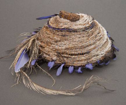 Australian Indigenous (Aboriginal and Torres Strait Islander) artwork by LISA WAUP of Baluk Artists. The title is Home. [216-15] (Found Materials and Fibres)