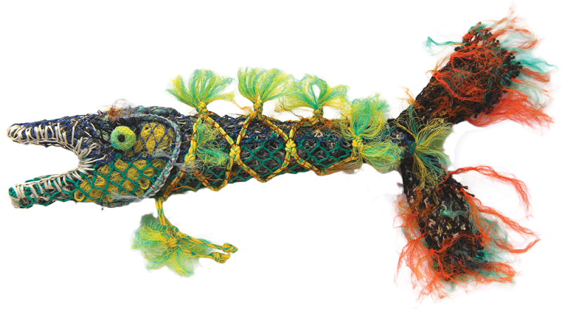 Australian Indigenous (Aboriginal and Torres Strait Islander) artwork by ELLAROSE SAVAGE of Erub Erwer Meta. The title is Jack the Barracuda. [15-91] (Ghost Nets & Twine over Mesh Frame)