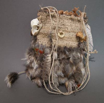 Australian Indigenous (Aboriginal and Torres Strait Islander) artwork by LISA WAUP of Baluk Artists. The title is Knowledge. [466-14] (Found Materials and Fibres)