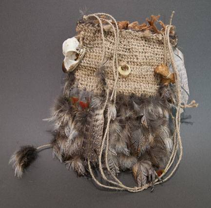 Australian Indigenous (Aboriginal and Torres Strait Islander) artwork by LISA WAUP of Baluk Artists. The title is Knowledge. [466-14] (Found Materials and Fibres)