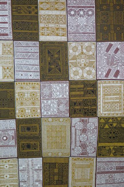 Australian Indigenous (Aboriginal and Torres Strait Islander) artwork by MARIE SIMPLICIA TIPUAMANTUMIRRI of Munupi Artists. The title is Pupuni Jilamara. [16-116] (Ochre on Canvas)