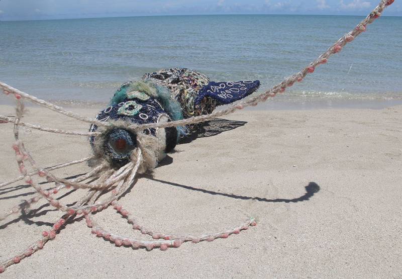 Australian Indigenous (Aboriginal and Torres Strait Islander) artwork by VARIOUS ERUB ERWER META ARTISTS (COLLABORATIVE) of Erub Erwer Meta. The title is Sager. [17-33] (Ghost Nets, Rope & Twine over Steel Frame)