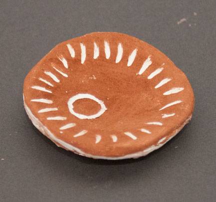 Australian Indigenous (Aboriginal and Torres Strait Islander) artwork by TALLARA GRAY of Baluk Artists. The title is Small Life Dish. [138-18] (Ceramic and Ochre)