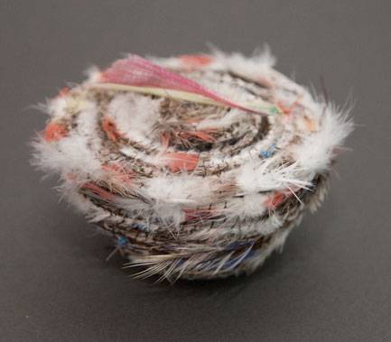 Australian Indigenous (Aboriginal and Torres Strait Islander) artwork by LISA WAUP of Baluk Artists. The title is Spirit. [225-15] (Found Materials and Fibres)