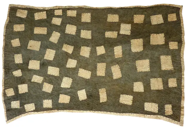 Australian Indigenous (Aboriginal and Torres Strait Islander) artwork by BRENDA KESI (ARIRÉ) of Omie Artists. The title is Taliobamë’e – Ancestral Design of the Mud. [OM12-004] (Sihoti’e Taliobamë’e - Appliquéd Mud-Dyed Barkcloth)