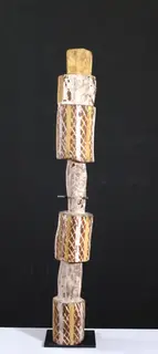 Australian Indigenous (Aboriginal and Torres Strait Islander) artwork by PADDY HENRY TIEMPI of . The title is Tiwi Pukamani Pole. [222] (Natural Earth Pigments on Wood)