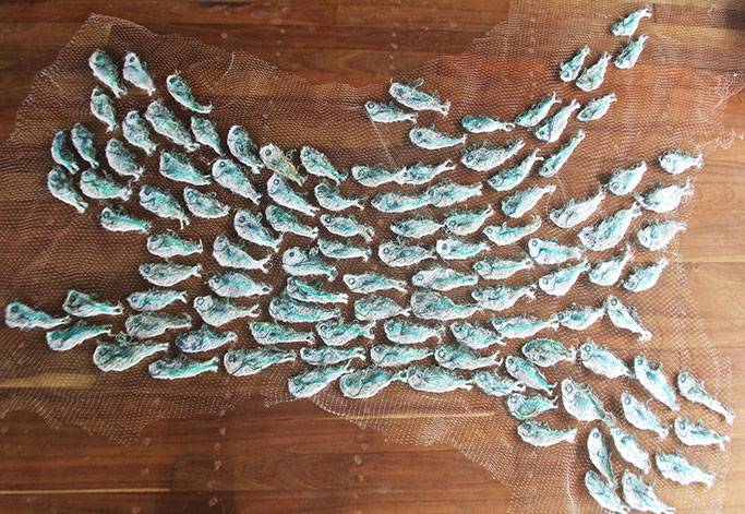 Australian Indigenous (Aboriginal and Torres Strait Islander) artwork by LYNNETTE GRIFFITHS of Miscellaneous Artists. The title is Tup - Sardines. [LG201705002_3/11] (Ghost Nets & Rope)
