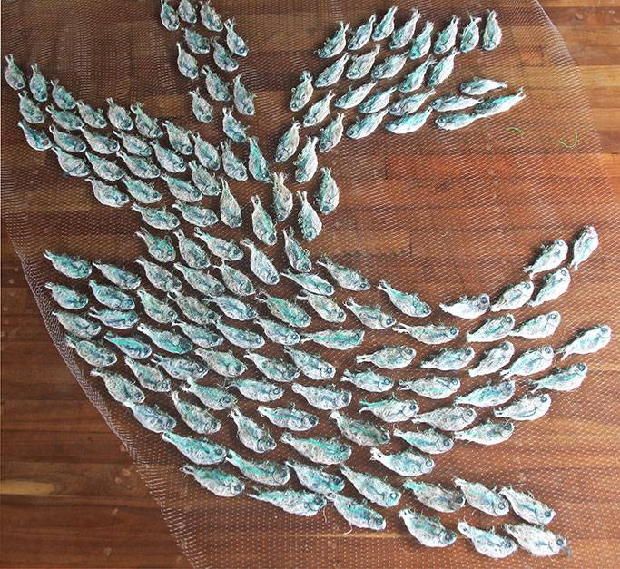 Australian Indigenous (Aboriginal and Torres Strait Islander) artwork by LYNNETTE GRIFFITHS of Miscellaneous Artists. The title is Tup - Sardines. [LG201705002_8/11] (Ghost Nets & Rope)