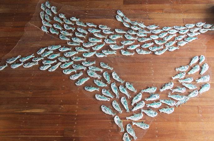 Australian Indigenous (Aboriginal and Torres Strait Islander) artwork by LYNNETTE GRIFFITHS of Miscellaneous Artists. The title is Tup - Sardines. [LG201705002_11/11] (Ghost Nets & Rope)