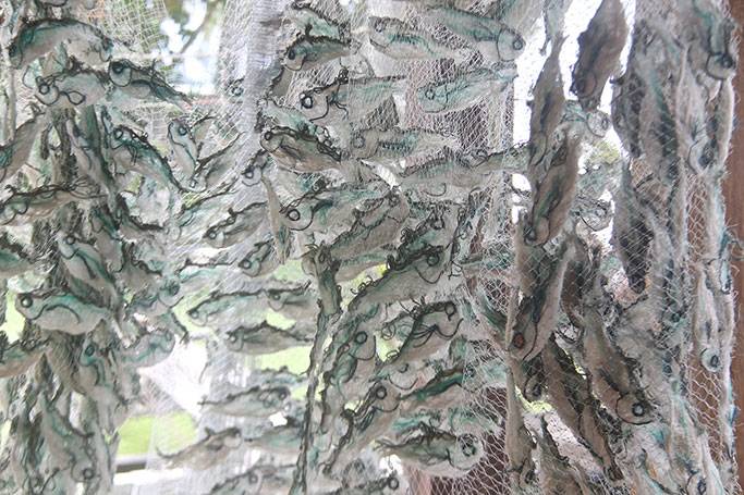 Australian Indigenous (Aboriginal and Torres Strait Islander) artwork by LYNNETTE GRIFFITHS of Miscellaneous Artists. The title is Tup - Sardines (Detail). [LG201705002] (Ghost Nets & Rope)