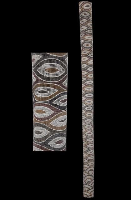 Australian Indigenous (Aboriginal and Torres Strait Islander) artwork by DHURRUMUWUY MARIKA of Buku-Larrnggay Mulka (Yirrkala). The title is Yuta Rulyapa. [3640W] (Natural Earth Pigments on Hollow Trunk)